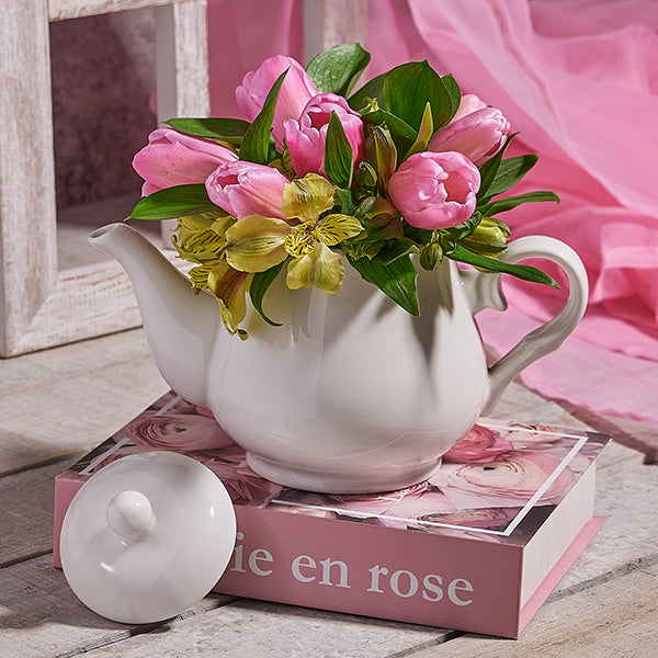 Tulip flower arrangement on a teapot